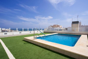 rentafive Terraza Piscina 2 min Playa